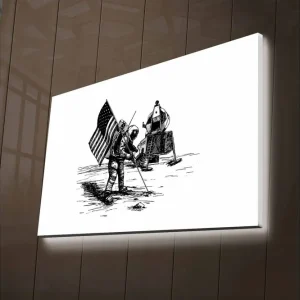 Canvastavla med LED-belysning - Astronaut som planterar en flagga på månens yta Svart / Vitt - Inredning Kundfavorit