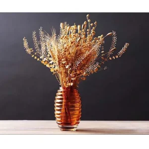 Erbjudandepris Canvastavla - Torkade blommor i en elegant glasvas Guld / Brun / Beige - Inredning