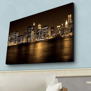 Fynd Canvastavla med LED-belysning - Storslagen stadsbild av en skyline med upplysta skyskrapor Guld / Svart / Grå - Inredning