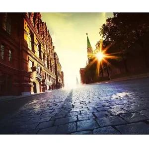 Nedsatt pris Canvastavla - Gatumiljö med historisk arkitektur och solnedgångens strålar Röd / Gul / Blå - Inredning
