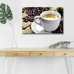 Rabatt Canvastavla med LED-belysning - Kopp med nybryggt kaffe omgiven av kaffebönor Vit / Brun / Grön - Inredning
