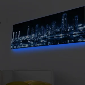 Canvastavla med LED-belysning - Nattlig stadssilhuett med upplysta skyskrapor Mörkblå / Svart / Vit - Inredning Sista chansen