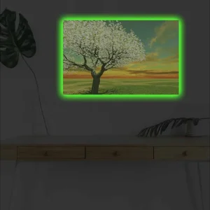 Canvastavla med LED-belysning - Blomstrande träd vid solnedgången Grön / Vit / Orange - Inredning Beställ idag