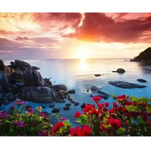 Canvastavla - Vacker solnedgång över havet med blommor i förgrunden Rosa / Blå / Orange - Inredning Fri frakt