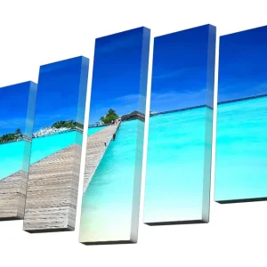 Canvastavla i 5 delar 82x50 cm - Klarblå himmel över en turkos lagun med en träbro Turkos / Blå / Vit - Inredning Beställ nu