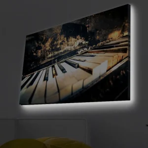 Erbjudande Canvastavla med LED-belysning - Svart piano med vita tangenter i en nostalgisk komposition Svart / Vit / Brunt - Inredning