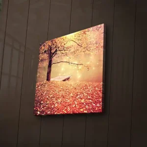 Rabatter Canvastavla med LED-belysning 28x28 cm - Vacker höstscen med ett träd och en båt vid en spegelblanka sjö Orange / Guld / Brun - Inredning
