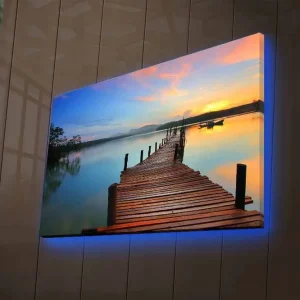 Canvastavla med LED-belysning - Solnedgång över en träbrygga vid vattnet Orange / Blå / Brun - Inredning risnedsättning